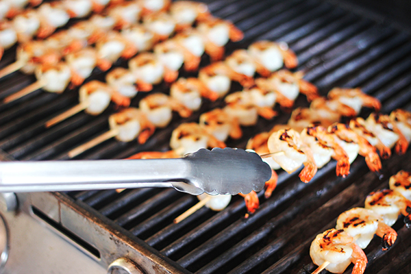 Coconut-Rum Shrimp - Remove from Grill with OXO Good Grips Tongs