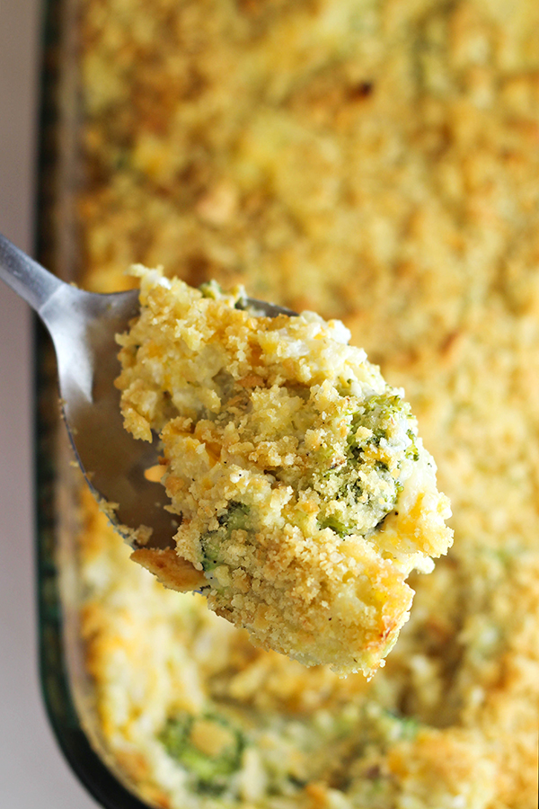 Easy Broccoli Rice Casserole recipe -- the ultimate comfort food! It's filling, great for potlucks, and easy to make for dinner or holiday parties.