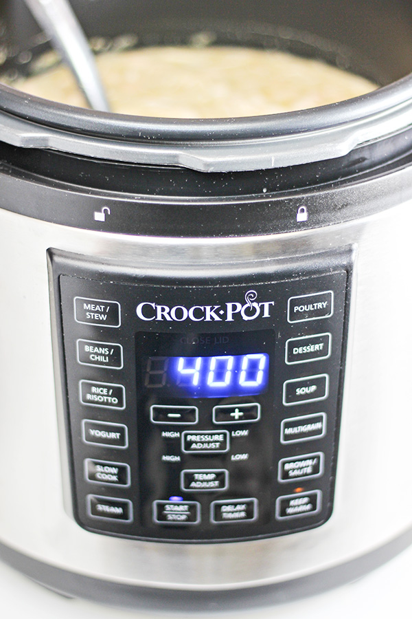 Closeup of the Crock-Pot Express Crock Multi-Cooker with White Chicken Chili in the Cooking Pot