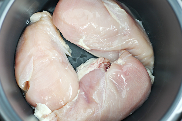 Raw Chicken Breasts in the Crock-Pot Express Crock Multi-Cooker