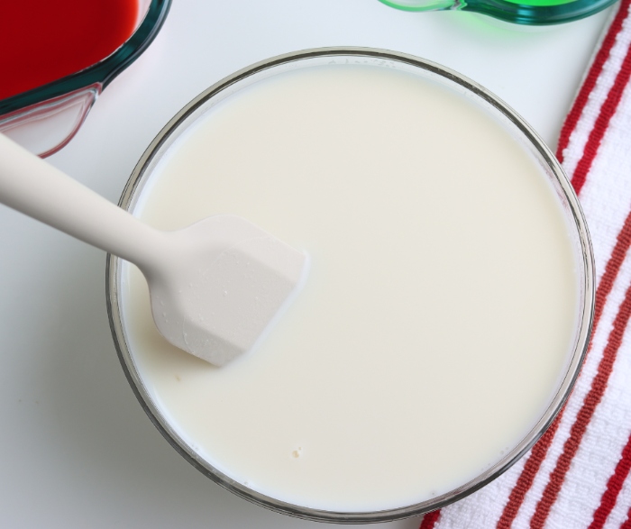 Combine Sweetened Condensed Milk after you make the hot water and unflavored gelatin mixture.