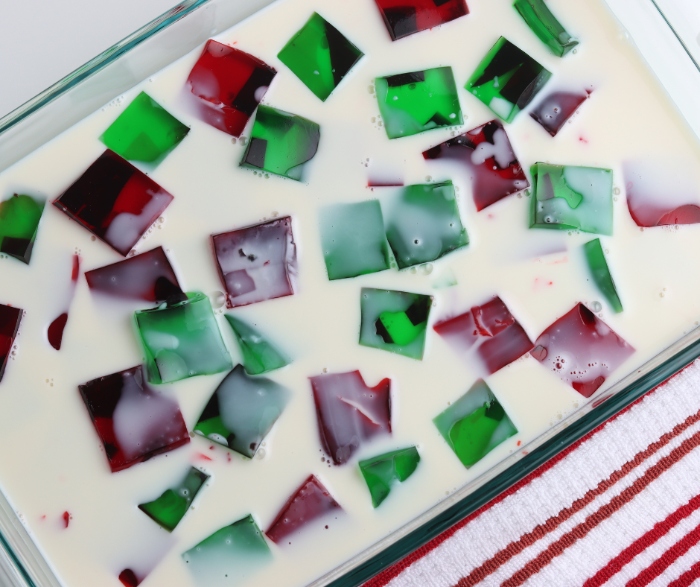 After pouring the milk and unflavored gelatin mixture over the the jello squares, place it in the fridge for 4 hours.