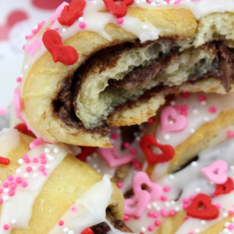 We got you covered with these sweet breakfast item... Check out our recipe for these Valentine's Day Nutella Crescents!