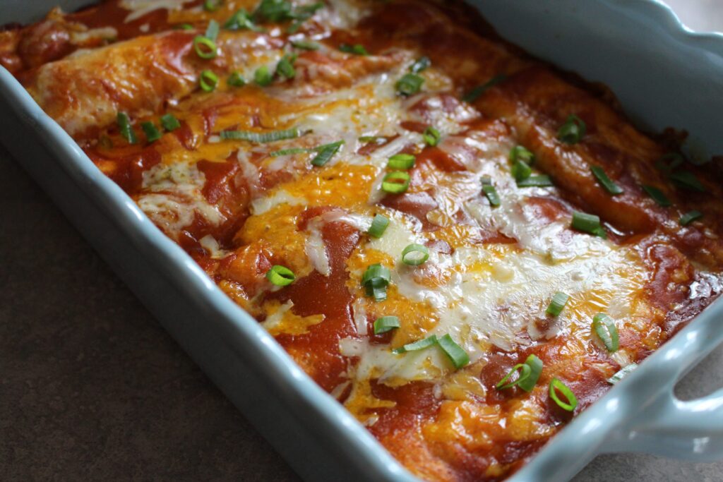 Save time on making homemade chicken enchiladas by using Canned Chicken!